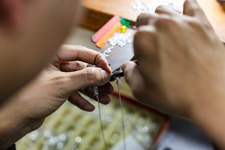 Jewelry polishing process in Chinese factory workshop